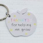 Helping Me Grow Apple Keyring