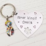 Amor Vincit Omnia Autism Keyring