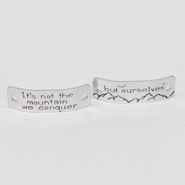 Stamped With Love - Not the mountains we conquer Trainer Tags
